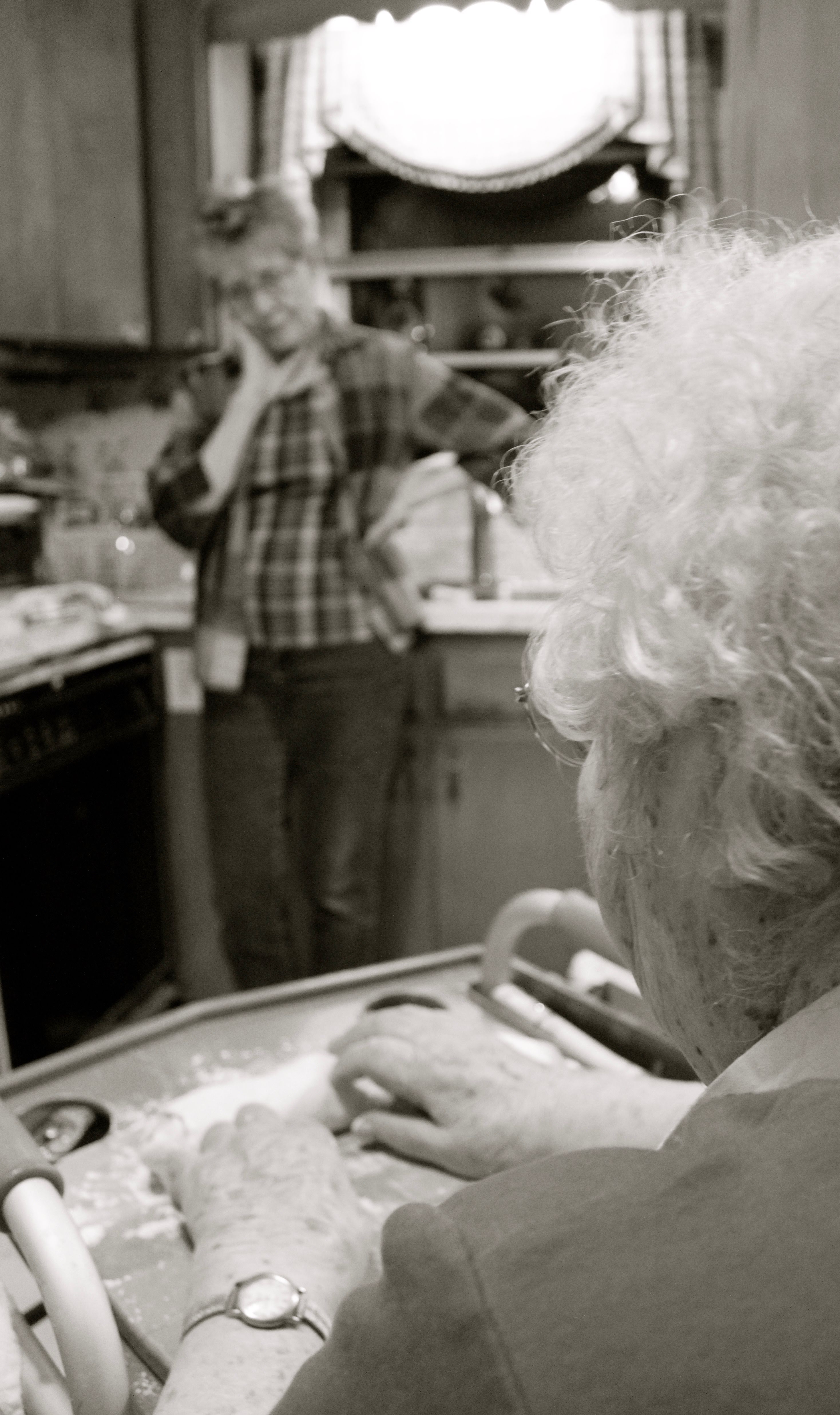 Three generations baking together in the kitchen