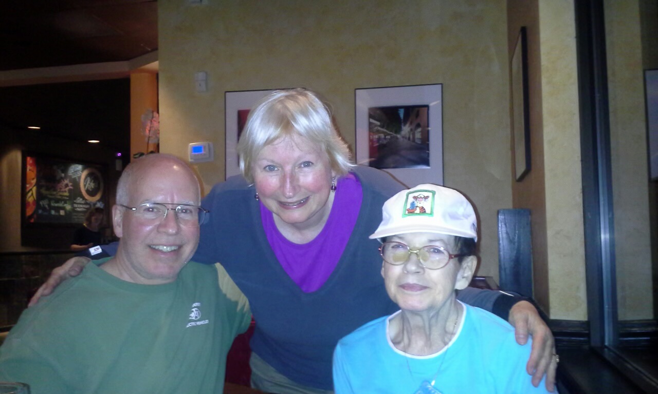 A family celebrating a mother's move back to a beloved community