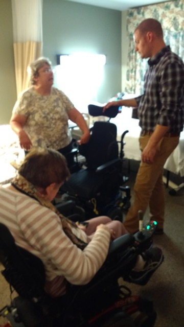 A devoted partner caring for an aging parent in a nursing home