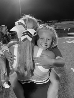 A babysitter and the young girl she cared for, now like family